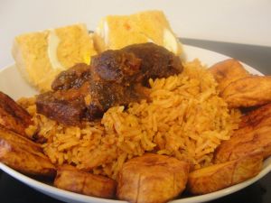 Party Jollof rice with plantain and moin-moin